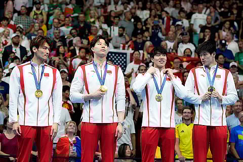 China's gold medal winners in Men's 4x100-meter medley relay